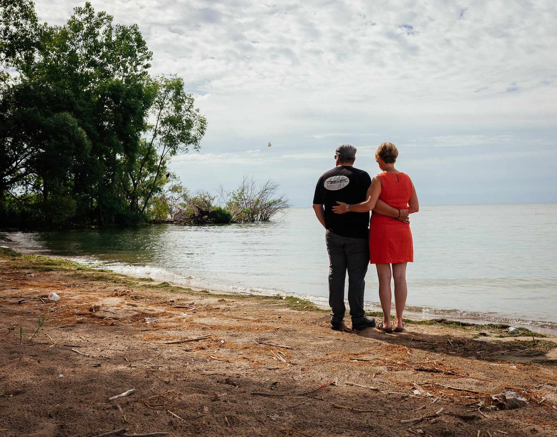 Anthony and Janet stand in Mettawas Park on Lake Erie, the original location of the Mettawas Resort.