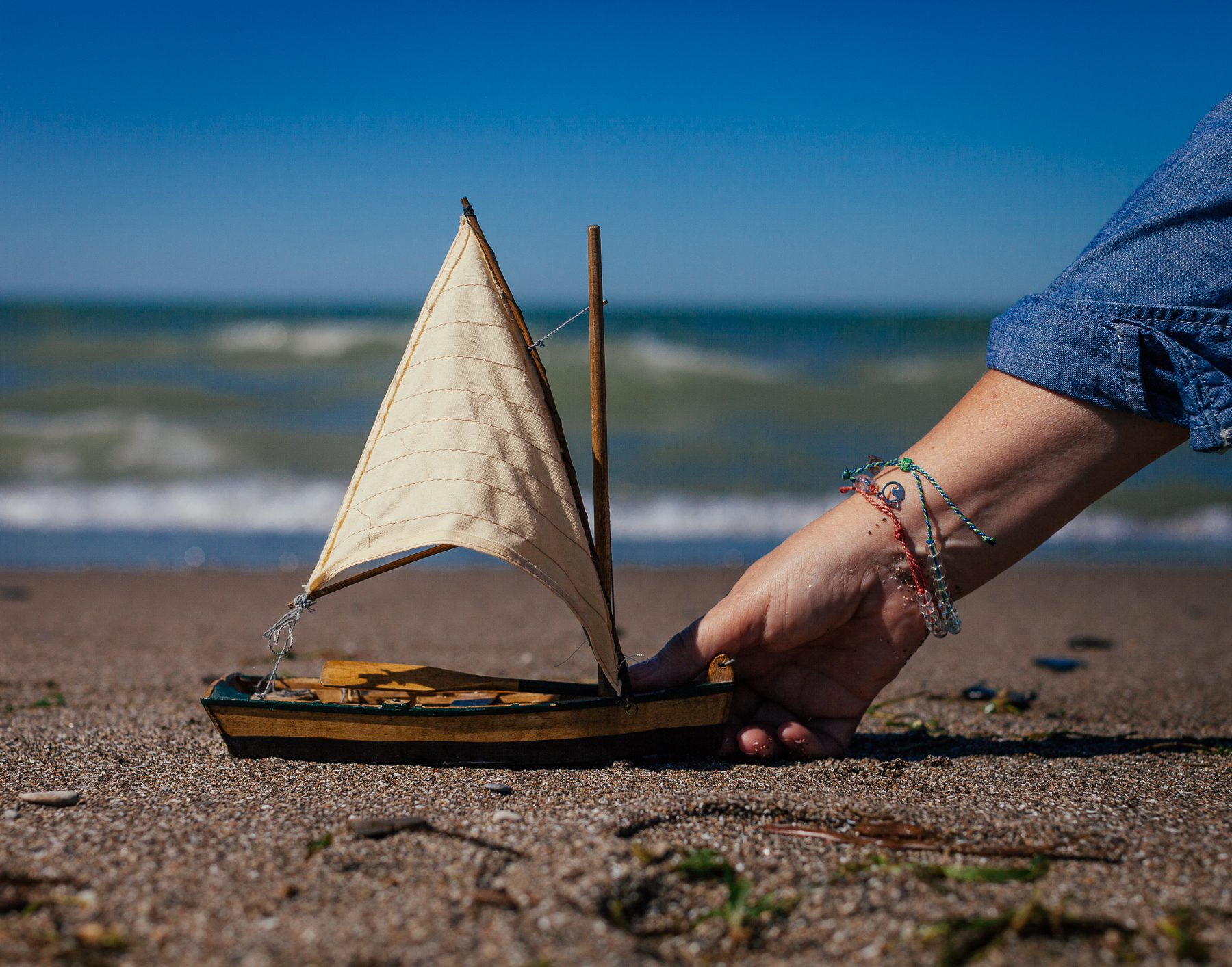On the way home from a field trip to Pelee Island in 1996 (her first year teaching), Lisa’s student Hillary asked her what she would buy from the gift shop. Lisa said she didn’t need anything, but Hillary told her she should buy a treasure to remember this special day. “I guess she was right because the boat still reminds me of that day!”