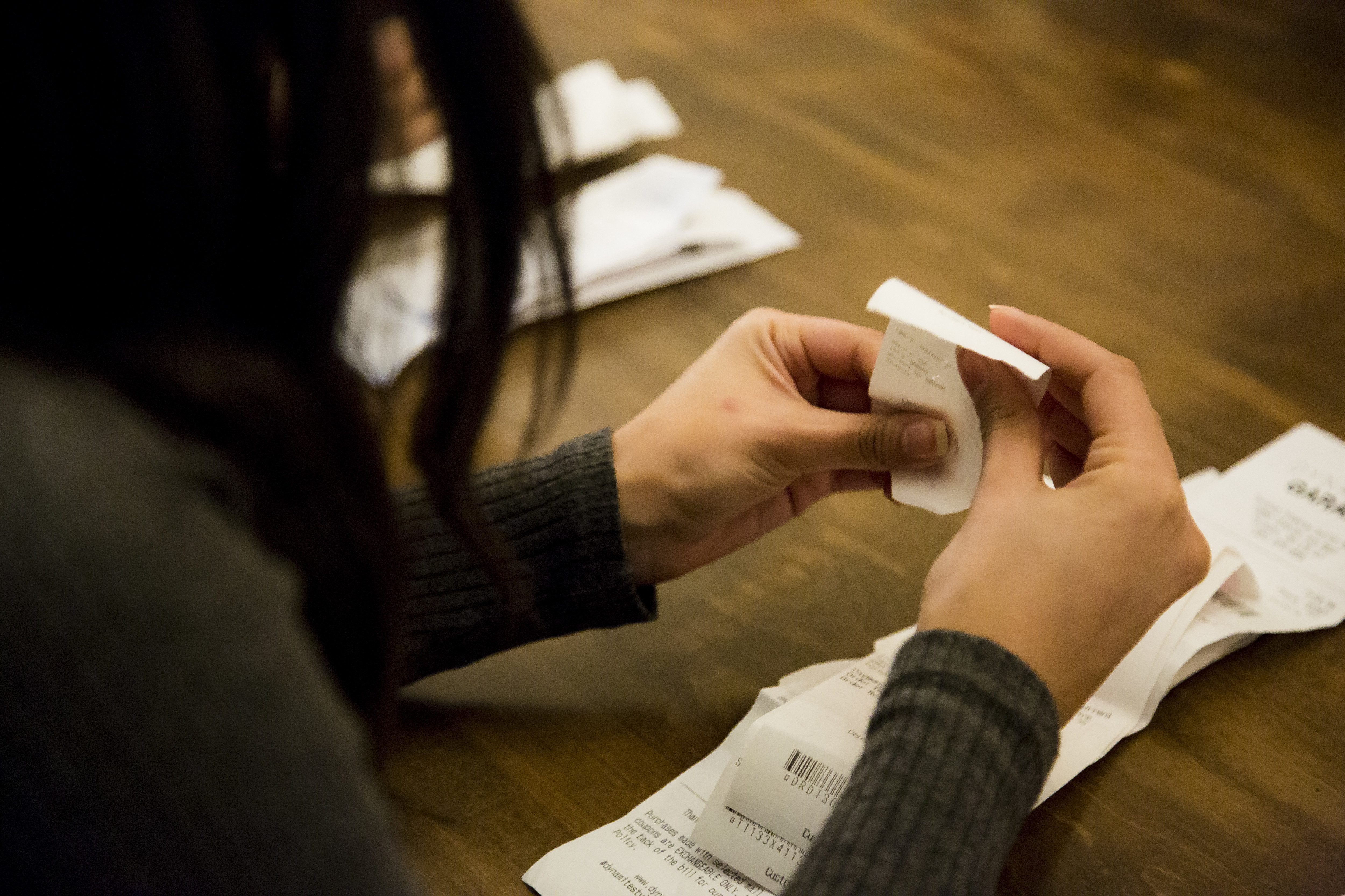 Woman handling a receipt